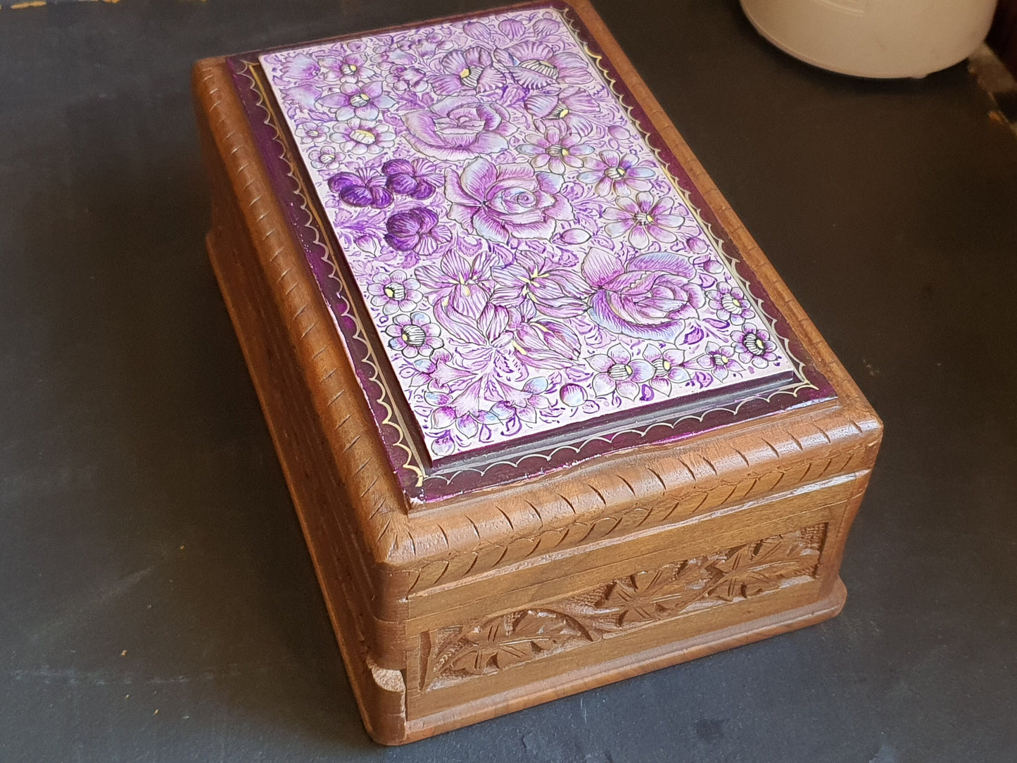 Wooden box for personalized jewellery storage with secret slider-
