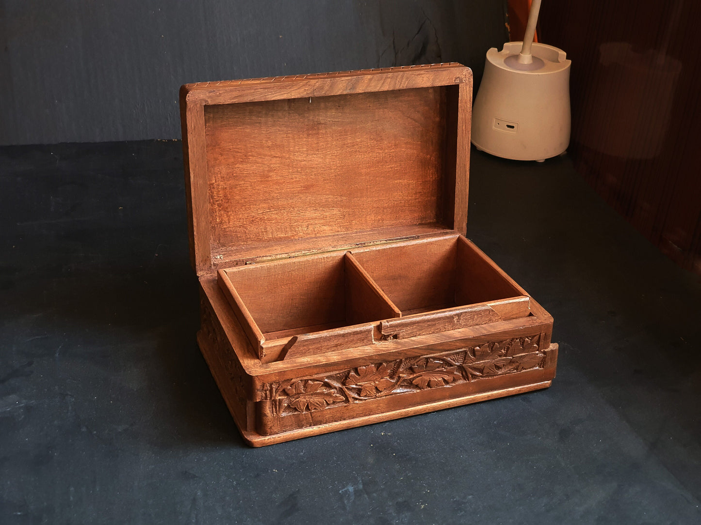 Wooden box for personalized jewellery storage with secret slider-