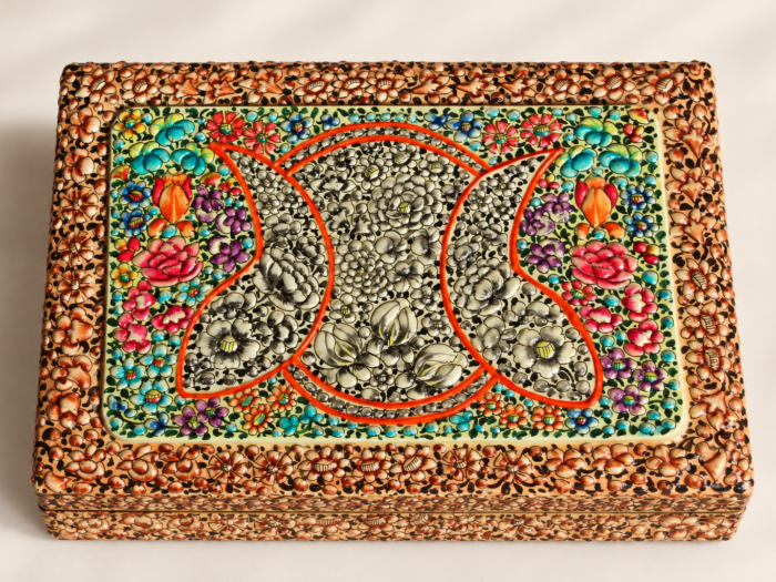 Orange floral hand-painted paper mache keepsake box from Kashmir, top view