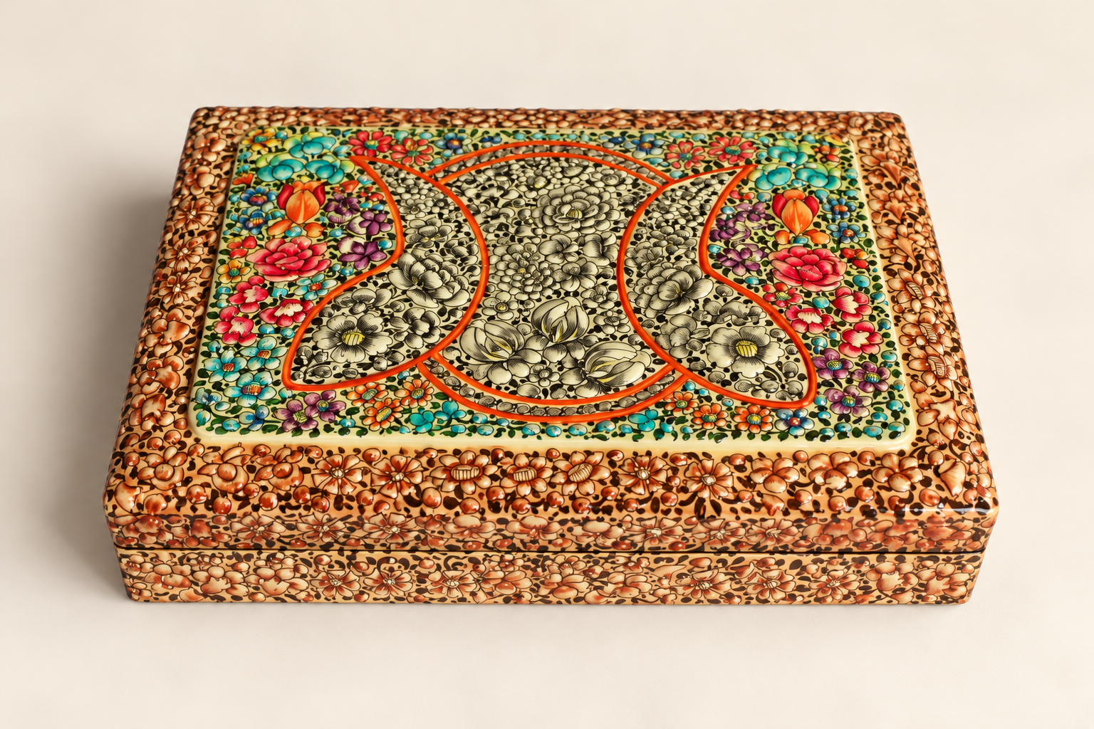 Orange floral paper mache keepsake box from Kashmir, side view