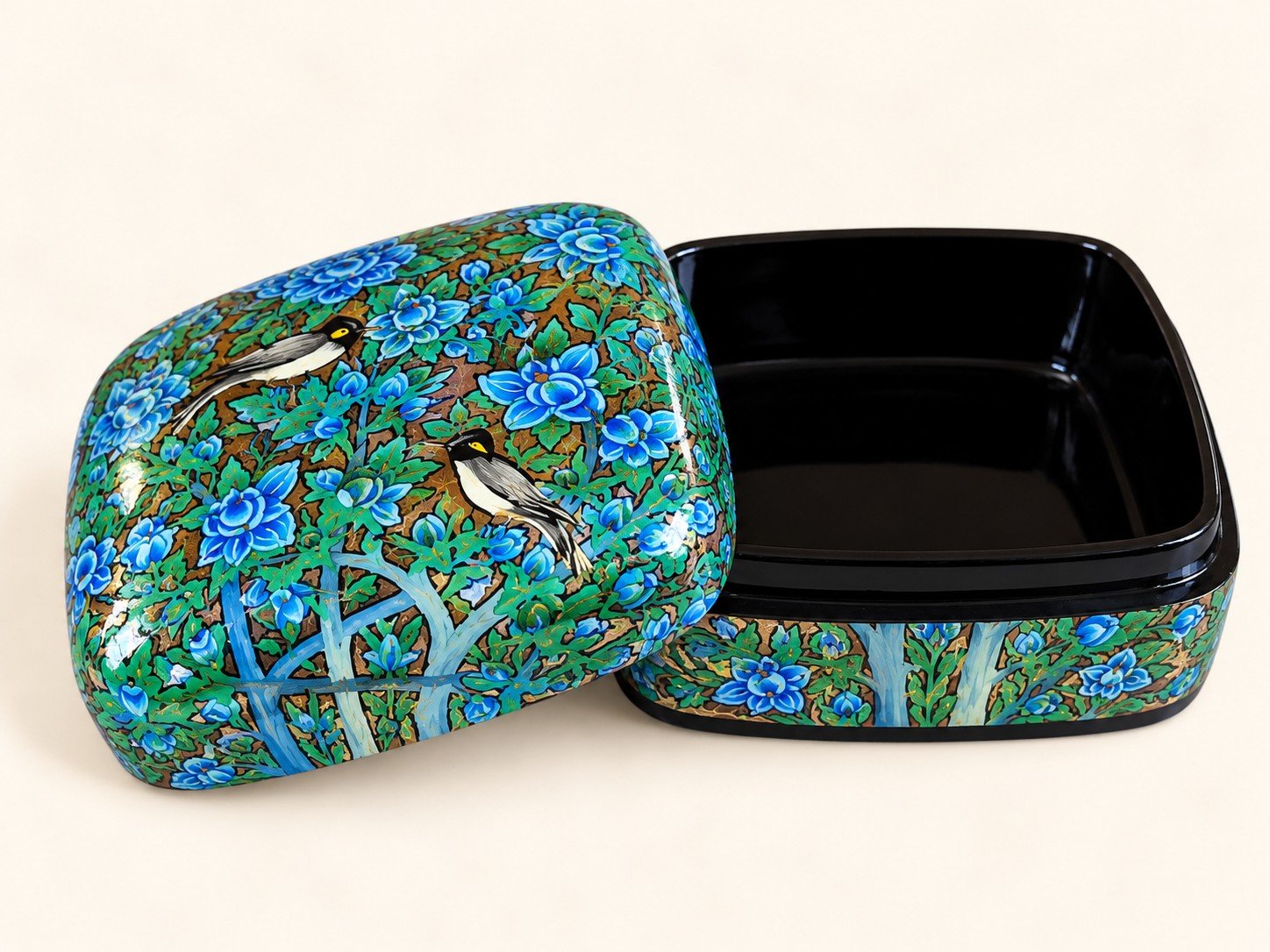 Open blue peony papier mache box with two hand-painted birds on the lid and glossy black lacquered interior