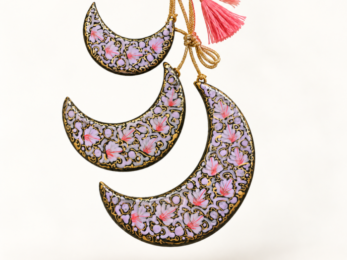 Set of 3 hand-painted papier mache crescent moon hanging ornaments in lilac and pink