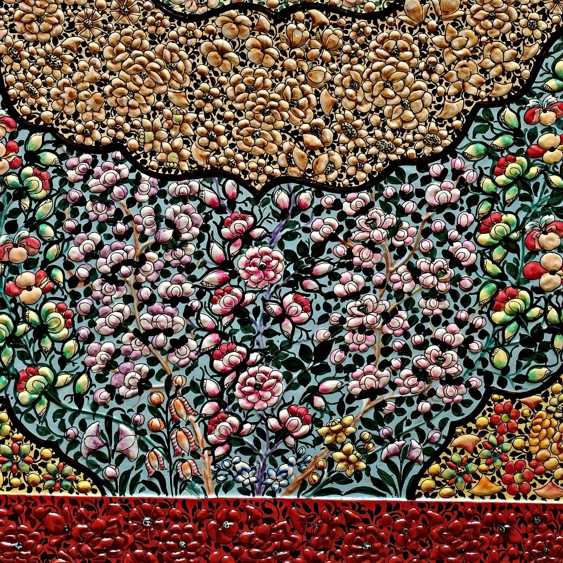 Close-up of the hand-painted blossom tree on a turquoise field