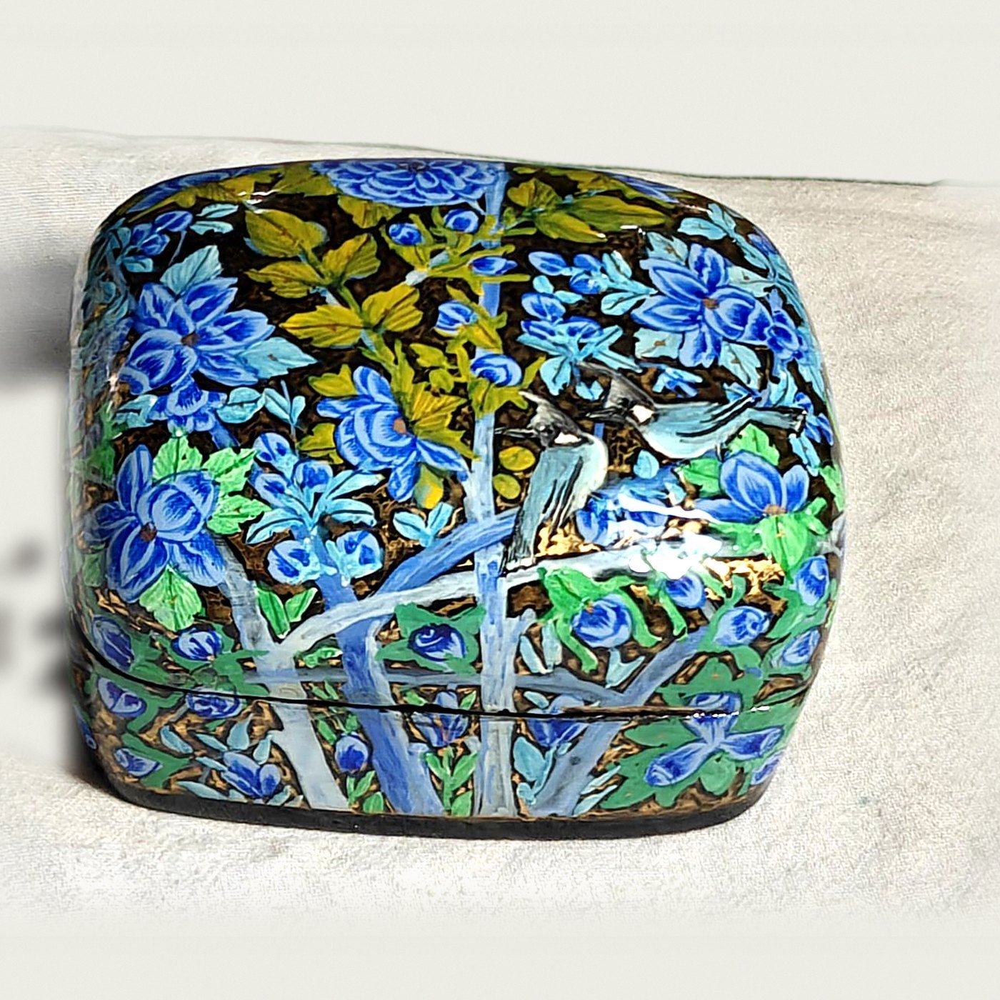 Bulbul papier mache box, Blue Garden No. 3, hand-painted with a pair of crested bulbuls and real 24K gold strokes, with the lid on