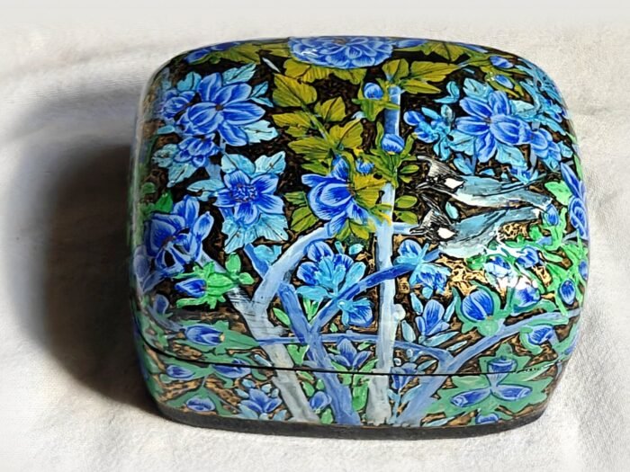 24K gold papier mache box, Blue Garden No. 6, hand-painted with two bulbuls in flight and real 24K gold strokes, with the lid on