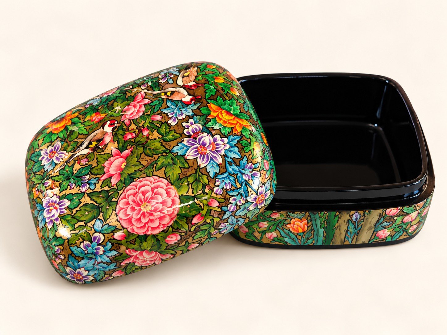 Open pink peony papier mache box showing glossy black lacquered interior and floral hand-painted lid