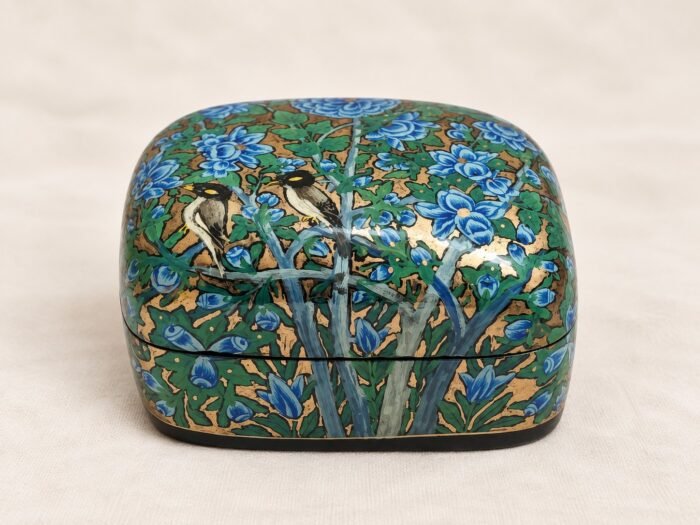 Blue papier mache box hand-painted with a pair of birds among blue flowers and green foliage on gold, small Kashmiri jewelry box