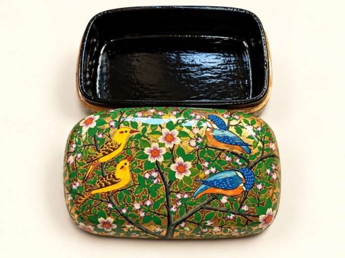 Open 7x4 inch papier mache box hand-painted with yellow birds and a blue kingfisher on flowering branches, glossy black lacquered interior